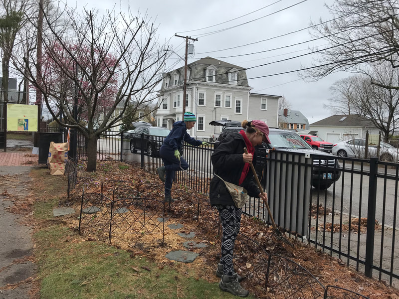 EGC members cleaning up at the village playground on commercial st.